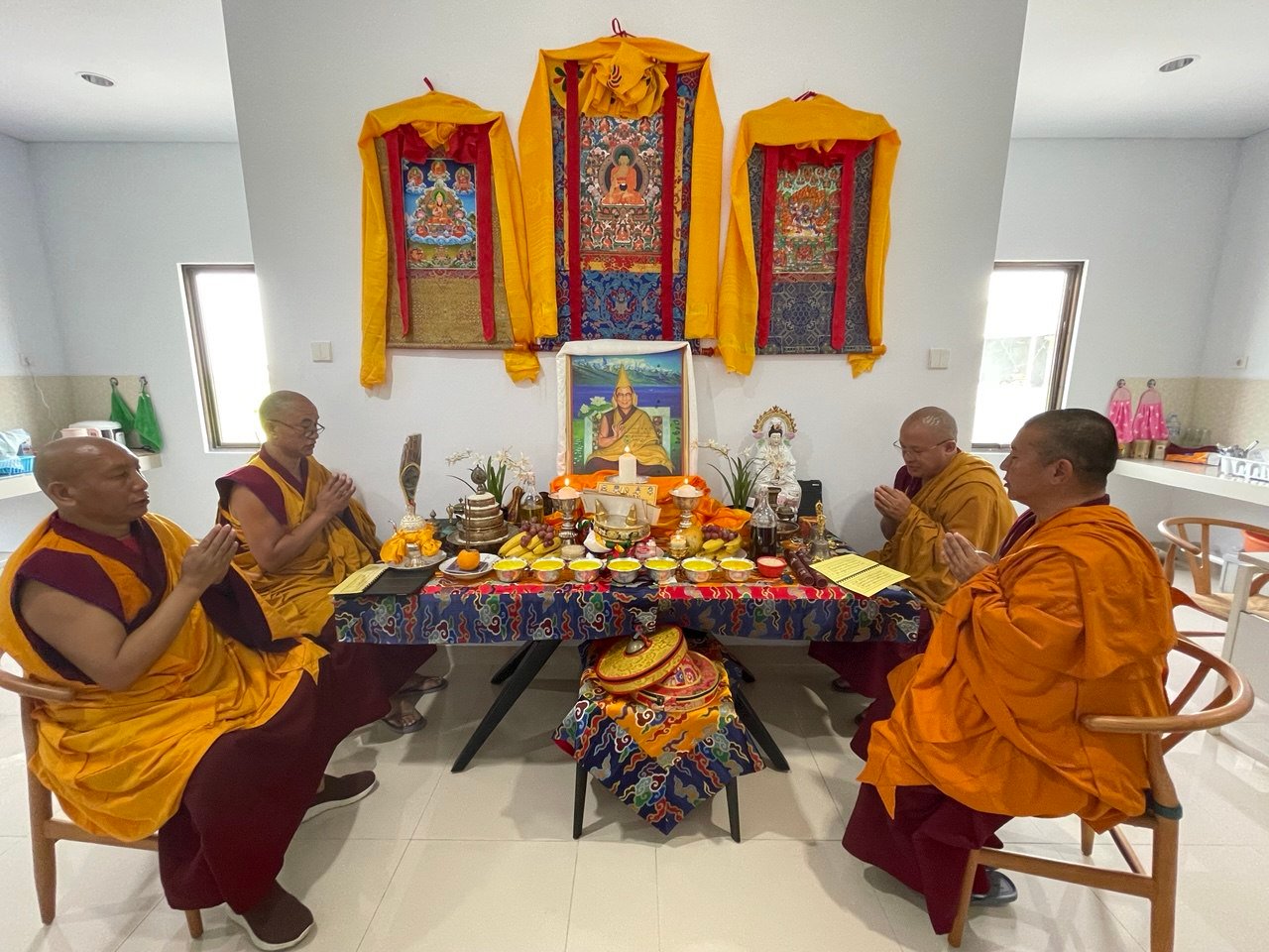 Monks in prayer at the altar