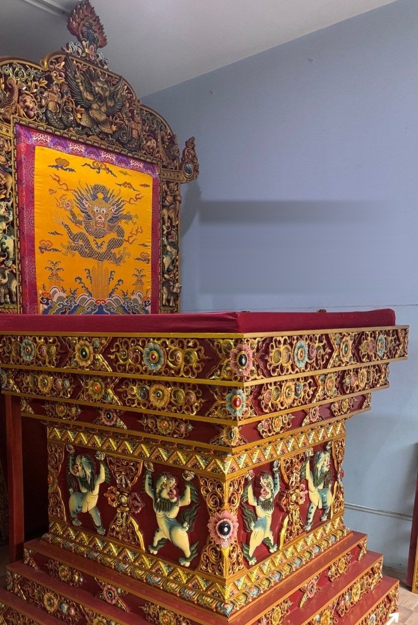 Hand-carved Tibetan shrine throne with gold dragon brocade and carved garuda crown